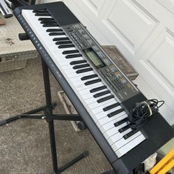 Casio LK-265 keyboard with keyboardstand and power supply-good condition. This is a really fun Keyboard and it has many many voices and songs, you can