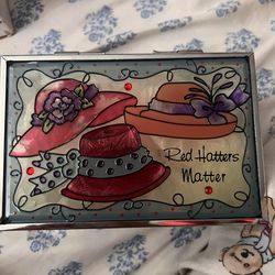 Beautiful joan bakers design ( red hatters matter)