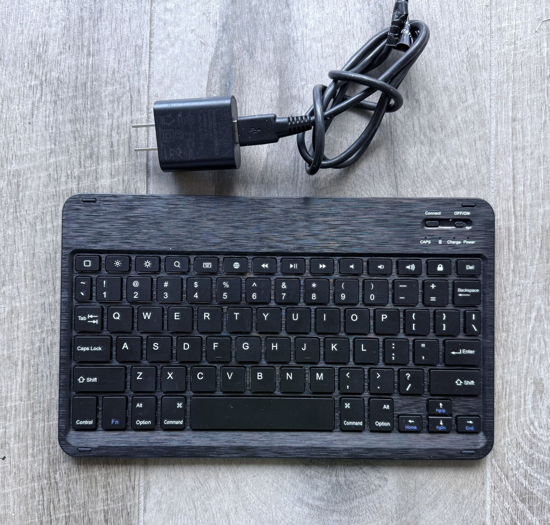 Ultra Thin, Lightweight Portable Bluetooth Keyboard 