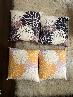 4 indoor /outdoor throw pillows