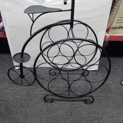 7 bottle Wine Rack in the Shape of a 19th Century Tricycle