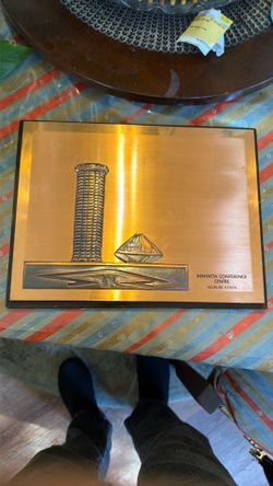 copper plaque featuring the Kenyatta International Convention Centre (KICC) in Nairobi, Kenya.