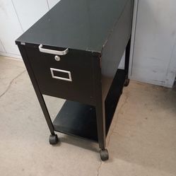 On casters metal file cabinet with key