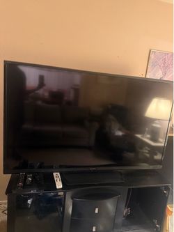 Estate Sale: 65’ TV and entertainment center