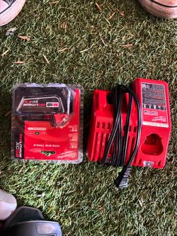 New Milwaukee M18 RED LITHIUM XC 5.0 Battery & Charger