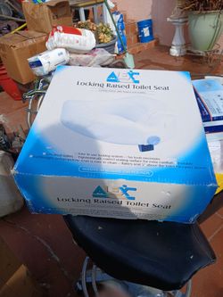 Asiento alto para el bano