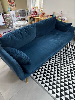 Two seat blue velvet couch
