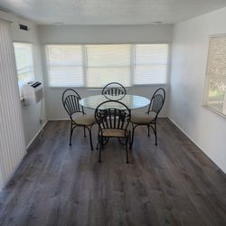 Nice Glass Top Dining Table & 4 Chairs - $95