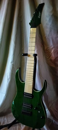 Like new Cozart 7 string electric guitar with bag cable and shoulder strap