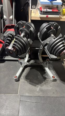 Bowflex 1090 dumbbells with stand