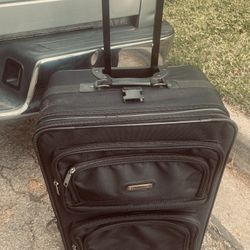 Suitcase.      Medium. 