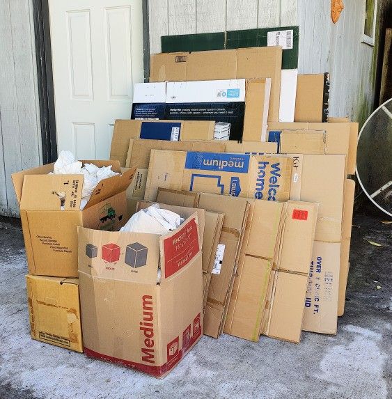 28 Moving Boxes & 2 bags of Packing Paper