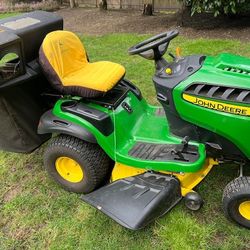 John Deere S240 Riding Mower.   (Pending)