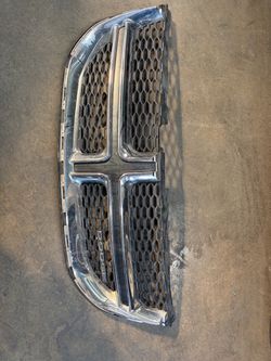 Upper grille for 2012 dodge caravan