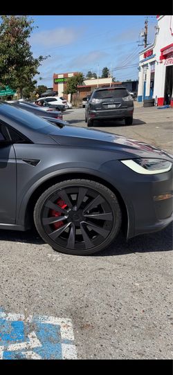 Tesla 22” plaid new plaid model x factory rims with as new tires staggered