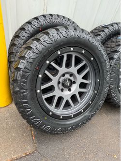 ON SALE  -NEW 20x9 wheels wrapped in RBP 33x12.50R20