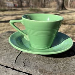  Harlequin teacup and saucer set made by the Homer Laughlin China Company.