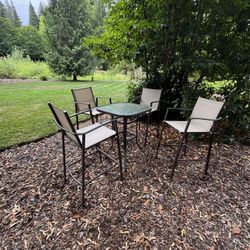 Bar Height Table And Four Barstools.