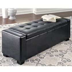 BLACK FAUX LEATHER STORAGE OTTOMAN