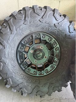 Camam X3 Stock Rims & Tires