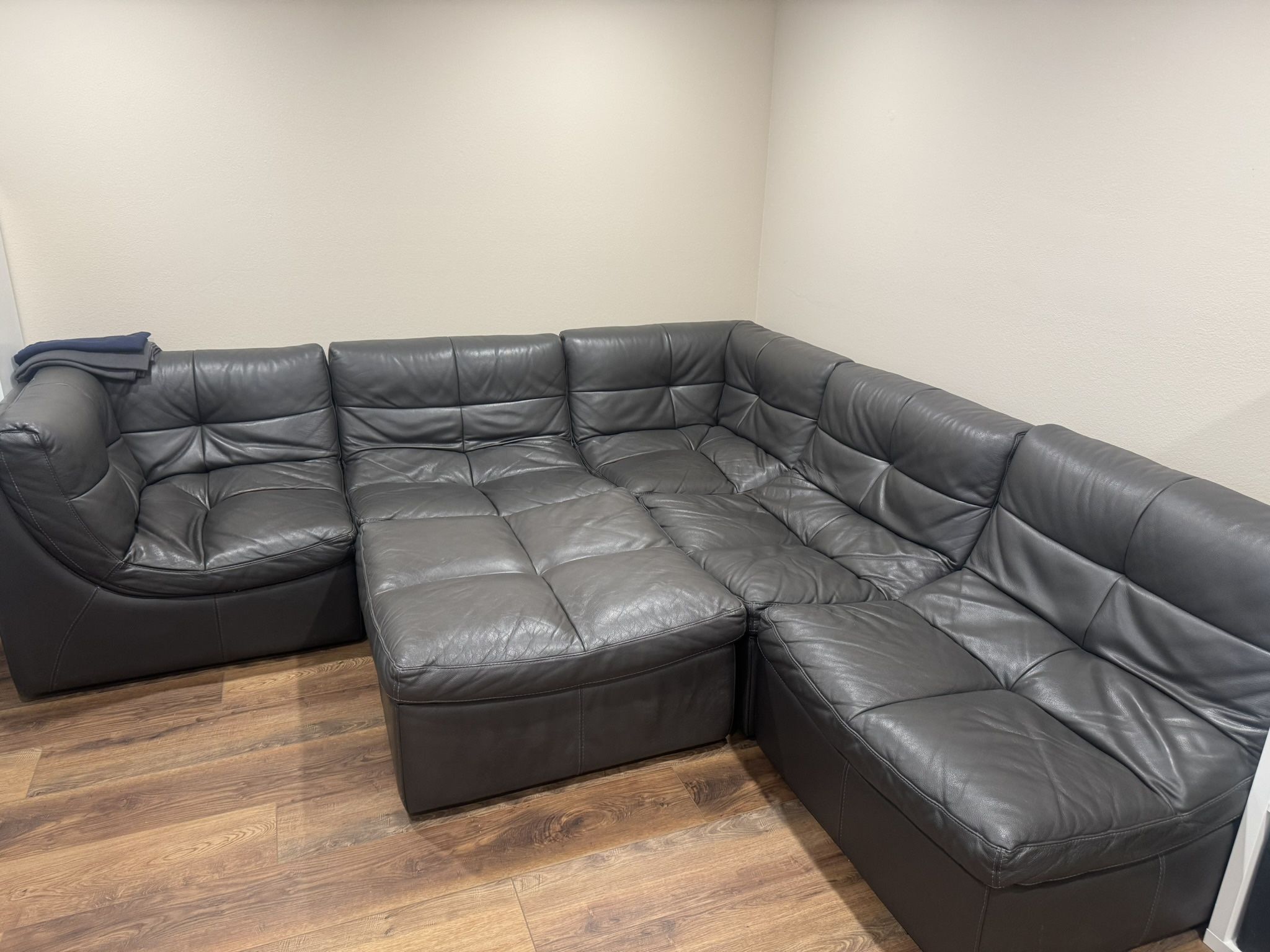 Furniture of America Onta Faux Leather Tufted Sectional and Ottoman in Gray