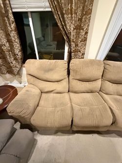 Couch recliners on both sides