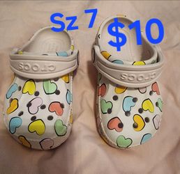 Toddler girl size 7 heart crocs $10