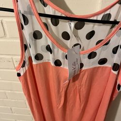 Brand New Coral-colored Tank Top with a white,  polka-dot sheer panel at the upper chest and shoulder area