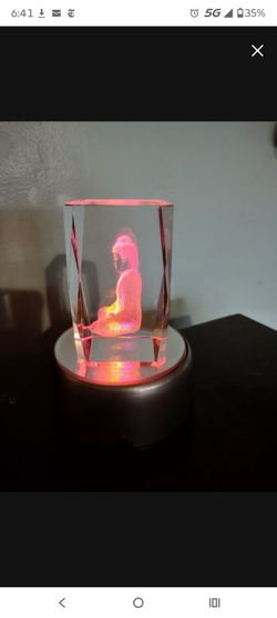 Rotating, laser-etched acrylic Buddha