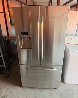 GE Stainless Steel Refrigerator And Freezer