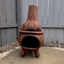 Outdoor clay Chiminea