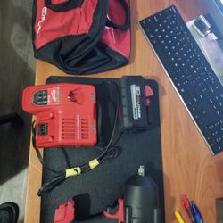 Milwaukee  M18 Fuel Impact Wrench Drill  1/2 With 8.0 Battery  Rapid charger  And Protective Boots 