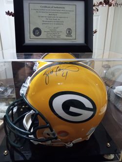 Brett farve assigned helmet in display case with certificate of authenticity
