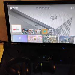 Xbox controller and headphones