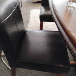 Table And Leather Chairs