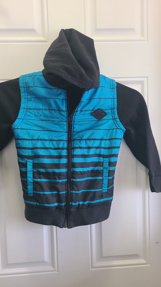 Tony Hawk Skateboarding medium 8-10. Looks like a black sweatshirt hoodie with a blue striped vest, cuffed bottom, 2 pockets. Polyester/cotton, east, 