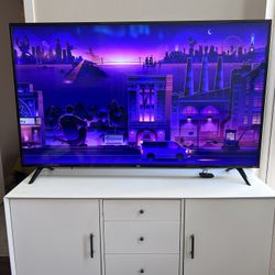65” Smart TV + White Mid-Century TV Stand – $475 for Both (Clean & Working)