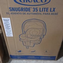 Brand New Graco Snugride Lx Lite