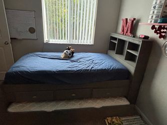 Twin double bed with a trundle
