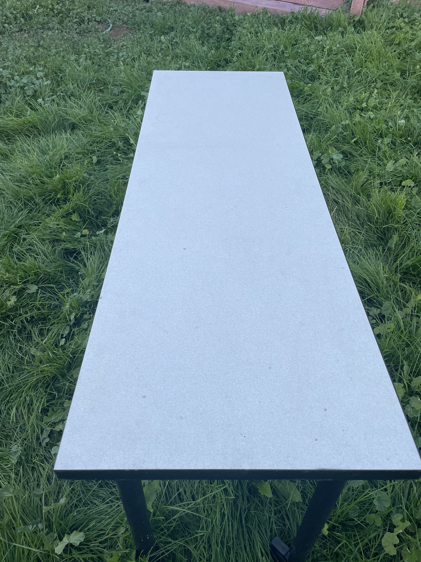 Long, rolling, white reading table. Measurements in photos. 