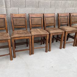 Six Tall Wooden Chairs