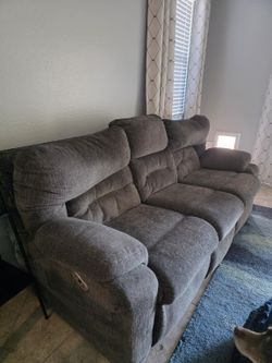 Power Reclining Sofa with USB & Console - $100