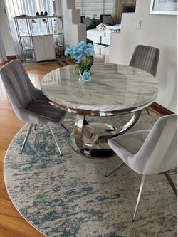 Small dining room table with 4 chairs