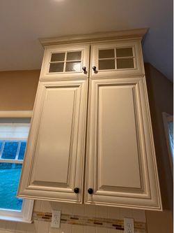 UPPER CABINETS cream colored
