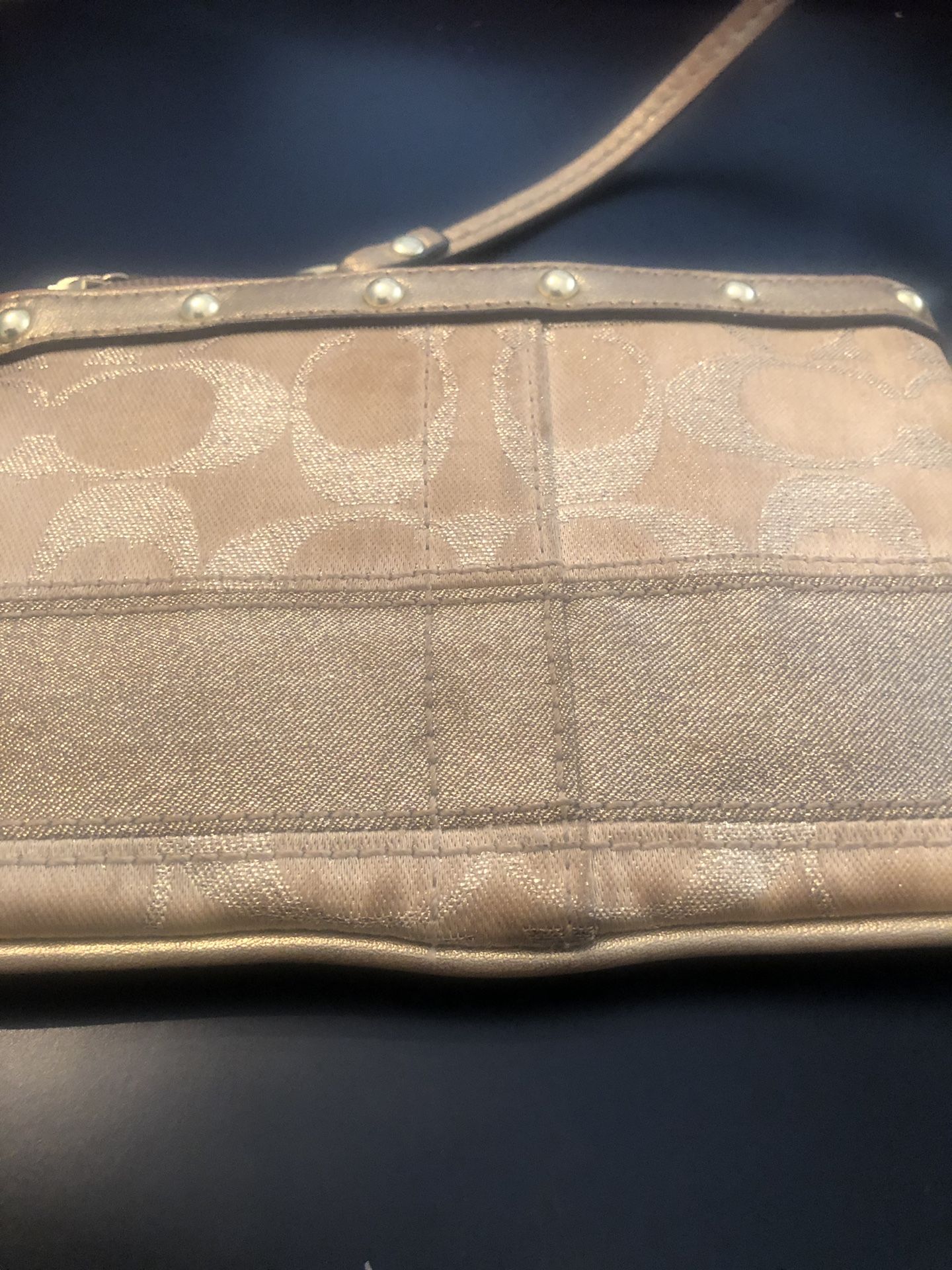 Coach gold wristlet