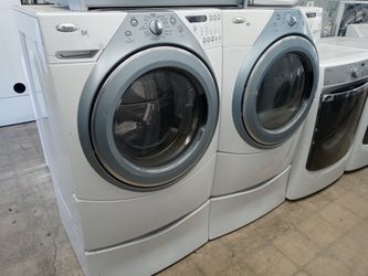 Whirlpool Duet front load washer and dryer set  on pedestals - Free delivery