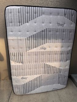 Full size sealy mattress (basically new)
