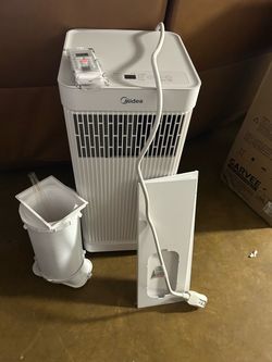 New 5000 BTU portable air conditioner cools 150 sq-ft rooms