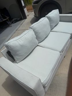 Light Gray Sofa with Cushions