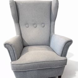 Beautiful gray wingback accent chair. Very comfortable and sturdy. Clean fabric and modern style. Perfect for living room, bedroom, or nursery. $65 OB